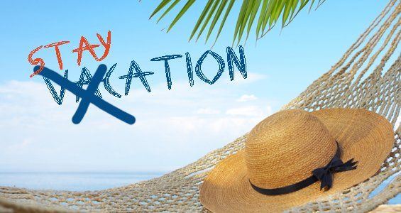 Sun hat in a hammock with the word staycation